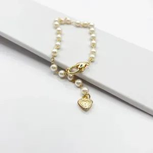 PULSEIRA PÉROLA COM FECHO E PINGENTE DE CORAÇÃO