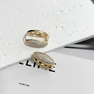 BRINCO ARGOLA ARTICULADA FORMATO SEMENTE CRAVEJADA 2,5CM