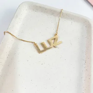 COLAR MANUSCRITO LUZ COM UMA PEDRINHA CRISTAL