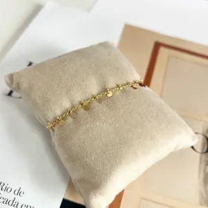 PULSEIRA GRUME COM ACESSÓRIOS REDONDOS
