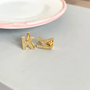 BRINCO ARGOLA ARTICULADA LETRAS - K