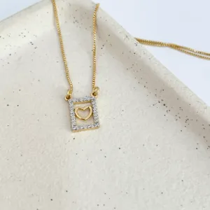 COLAR PINGENTE QUADRADO COM CORAÇÃO VAZADO