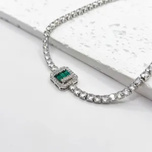 PULSEIRA RIVIERA COM PEDRA BAGUETE VERDE ESMERALDA