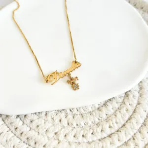 COLAR DINDA COM PINGENTE DE MENINA