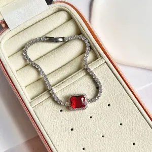 PULSEIRA RIVIERA COM PEDRA RUBI