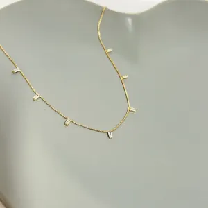 COLAR CHOKER COM 7 MINI PEDRAS BAGUETE