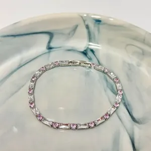 PULSEIRA BAGUETES E PONTO DE LUZ ROSA
