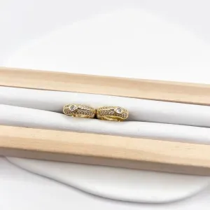 BRINCO ARGOLA ARTICULADA PONTO DE LUZ E MICRO ZIRCONIAS