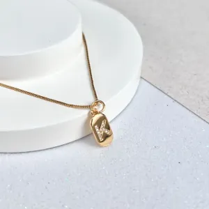 COLAR LETRA PLACA CRAVEJADA - K