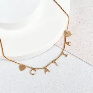 COLAR NOME COM CORAÇÃO NAS PONTAS - CATIA