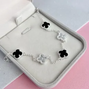 PULSEIRA TREVO MADRE PÉROLA PRETA E MICRO ZIRCONIAS