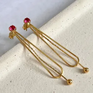 BRINCO PÊNDULO COM PEDRA RUBI