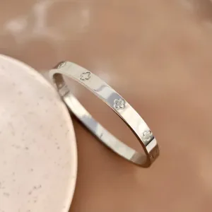 BRACELETE AÇO INOX TREVOS EM BAIXO RELEVO