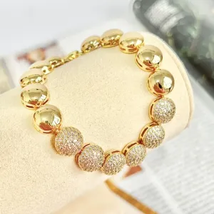 PULSEIRA MEIA ESFERA CRAVEJADA