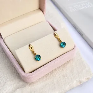 BRINCO PONTO DE LUZ STRASS AZUL PENDURADO