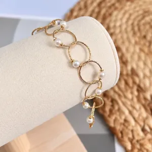 PULSEIRA ELOS COM 1 PÉROLA EM CADA