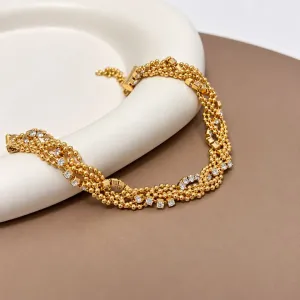 PULSEIRA TRANÇADA COM FIO DE STRASS