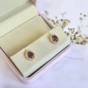 BRINCO OVAL PEDRA ROXA COM MICRO ZIRCONIAS