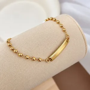 PULSEIRA DE BOLINHA INFANTIL COM PLACA