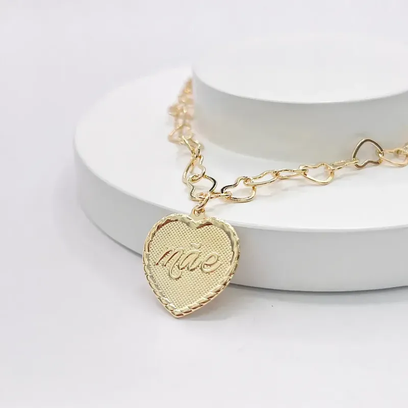 PULSEIRA ELOS CORAÇÕES COM PINGENTE CORAÇÃO ESCRITO MÃE