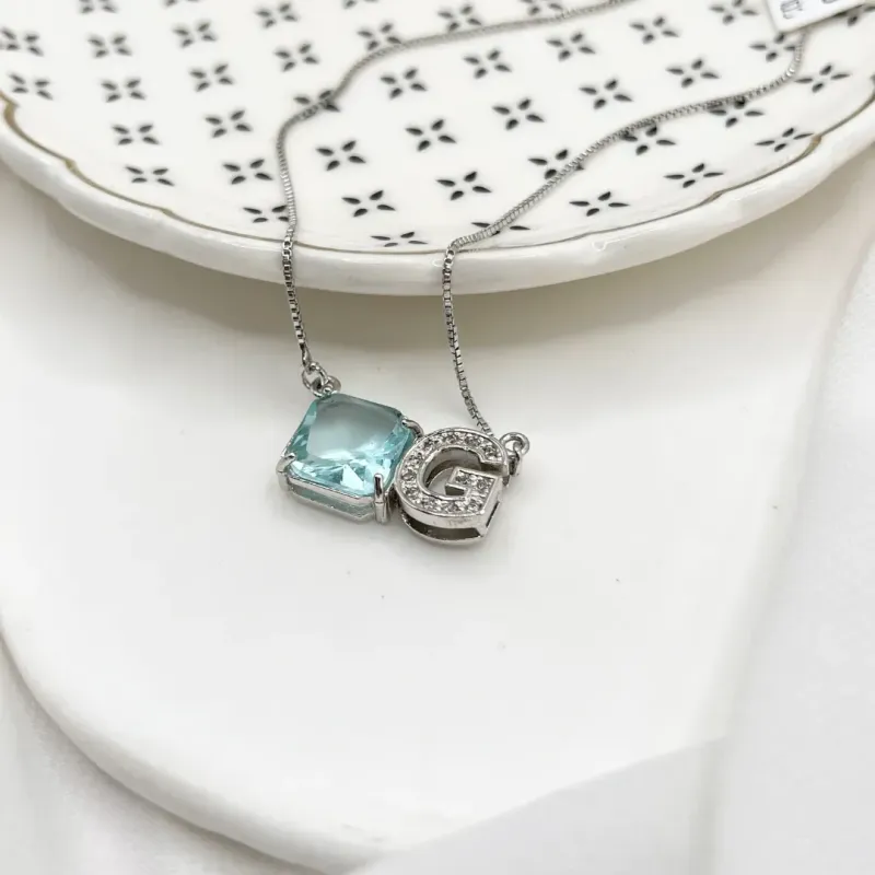 COLAR LETRA COM PEDRA ACQUA - G