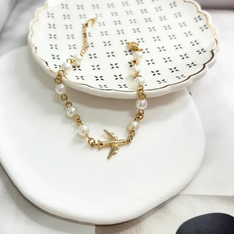 PULSEIRA PÉROLA E AVIÃO