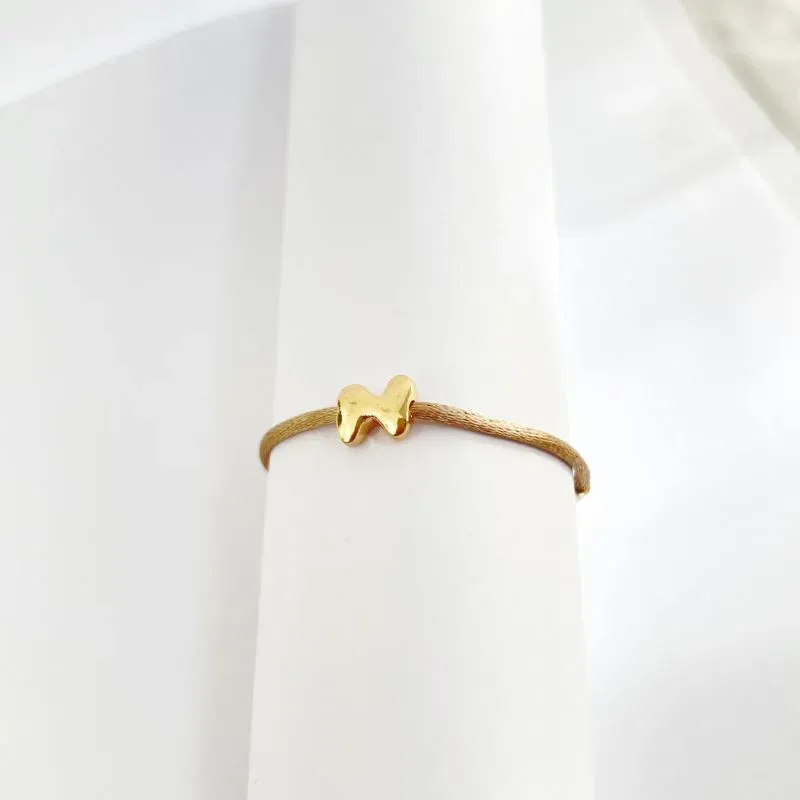 PULSEIRA FIO DE CERA COM PINGENTE DE LETRA - N