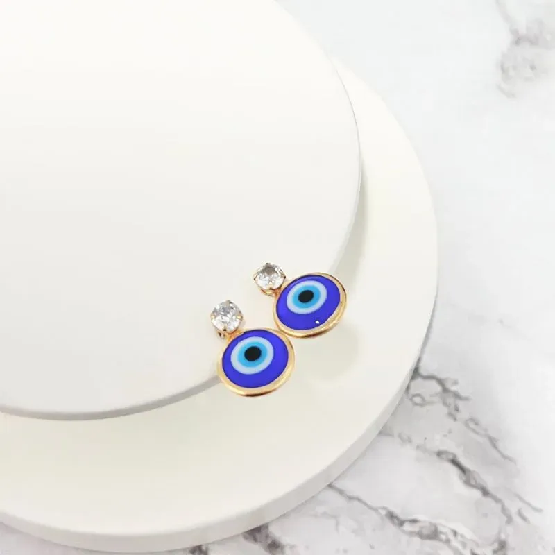 BRINCO OLHO GREGO COM PONTO DE LUZ