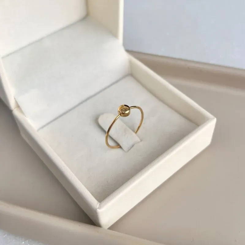 ANEL BOLA ACHATADA LISA