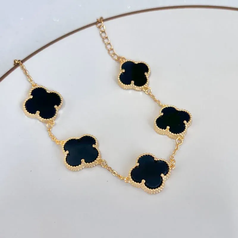 PULSEIRA 5 TREVOS EM MADRE PÉROLA PRETA