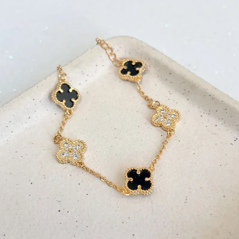 PULSEIRA TREVO MADRE PÉROLA PRETA E MICRO ZIRCONIAS