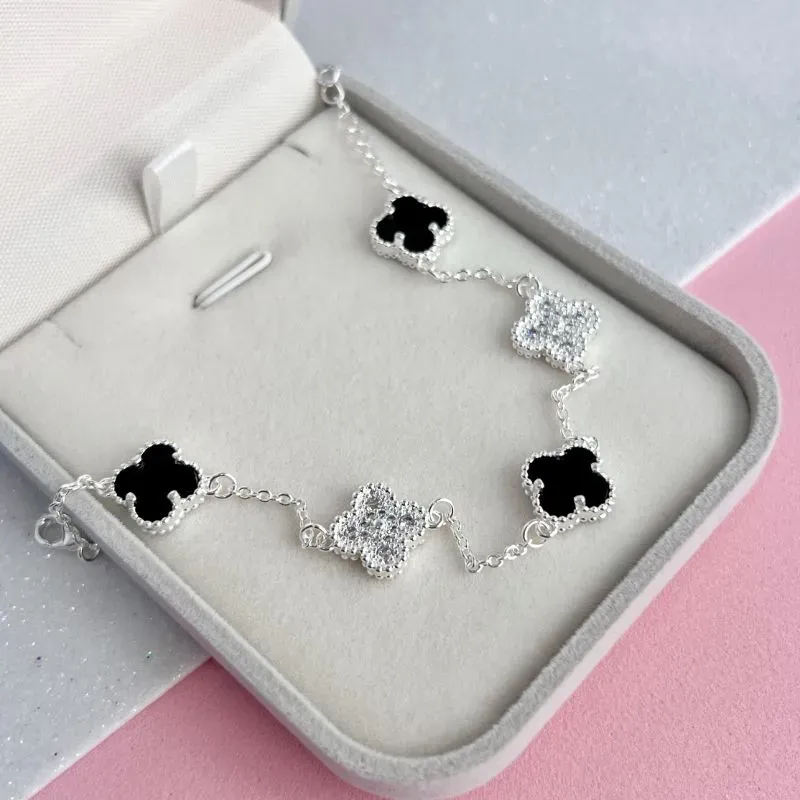 PULSEIRA TREVO MADRE PÉROLA PRETA E MICRO ZIRCONIAS