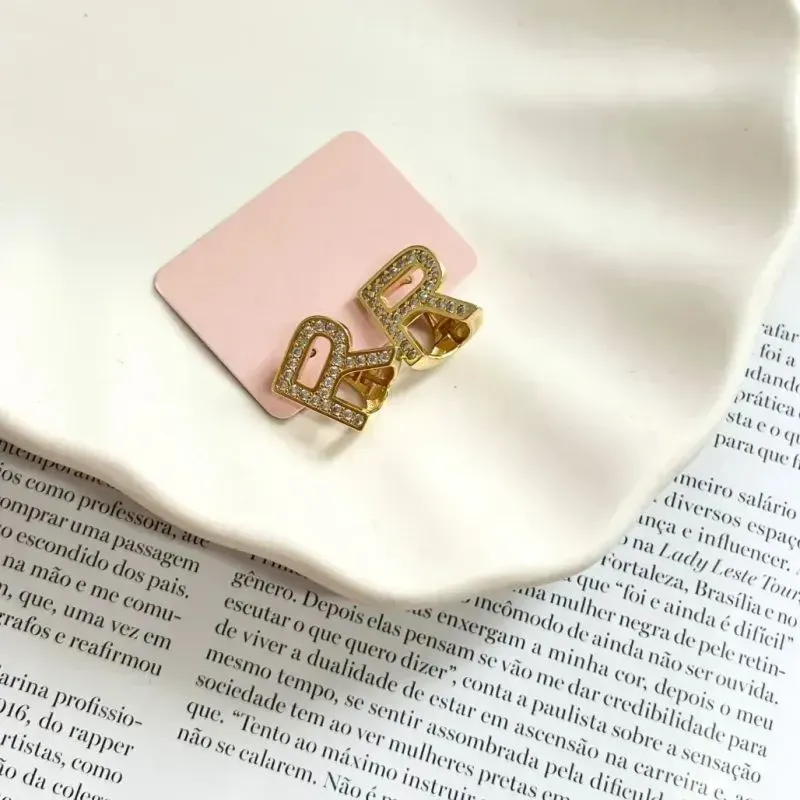 BRINCO ARGOLA ARTICULADA LETRAS - R