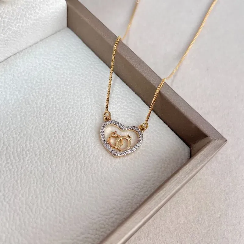 COLAR CORAÇÃO COM 2 SOLITÁRIOS