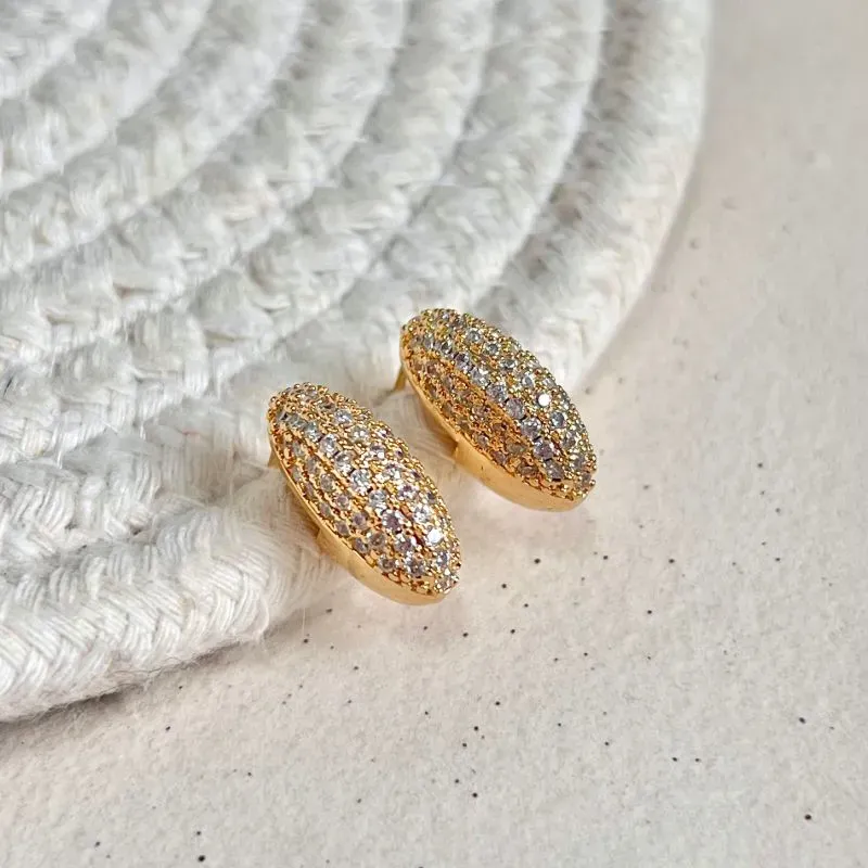 BRINCO FORMATO GRÃO DE ARROZ CRAVEJADO