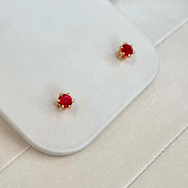 BRINCO PONTO DE LUZ STRASS VERMELHO 6 GARRAS ALTAS