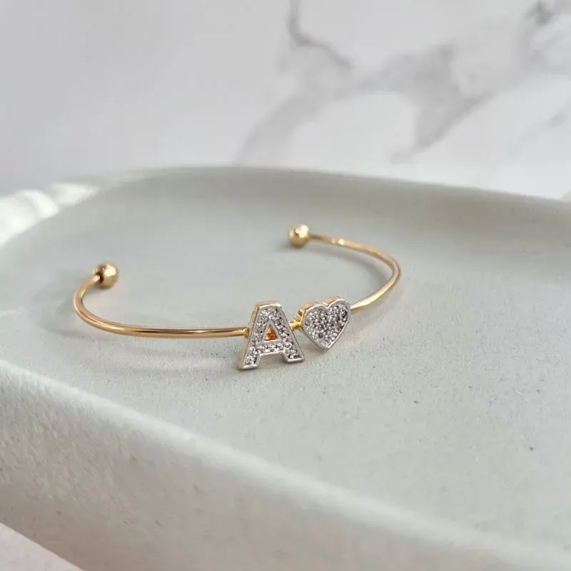 BRACELETE CORAÇÃO COM LETRA CRAVEJADO - A