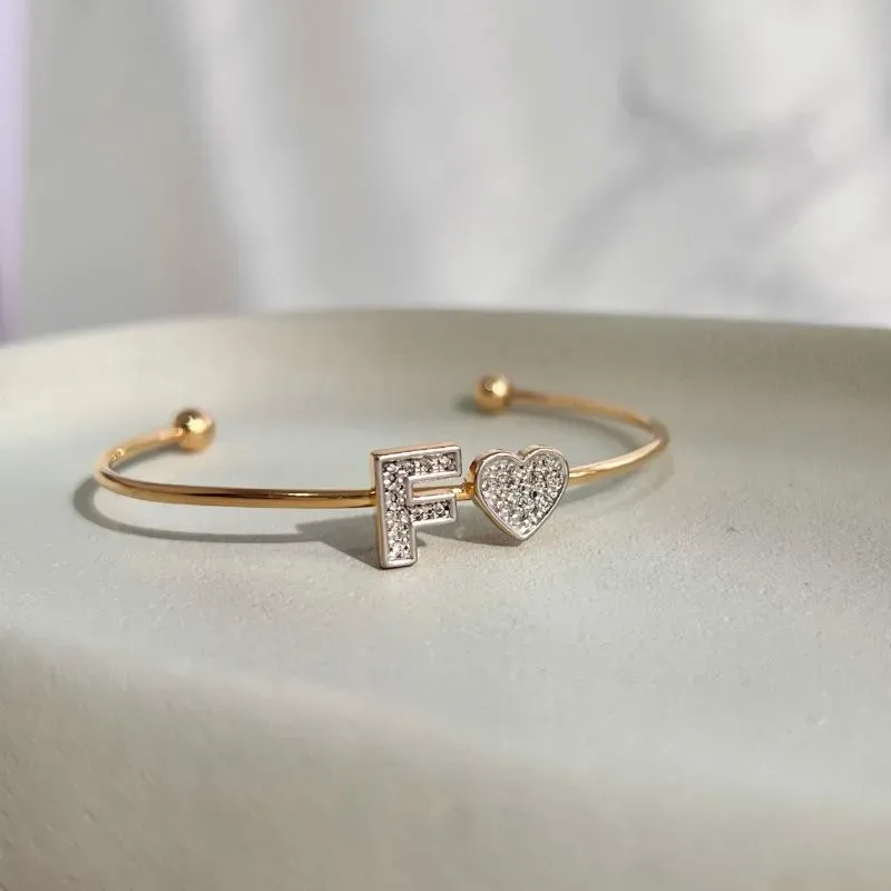 BRACELETE CORAÇÃO COM LETRA CRAVEJADO - F