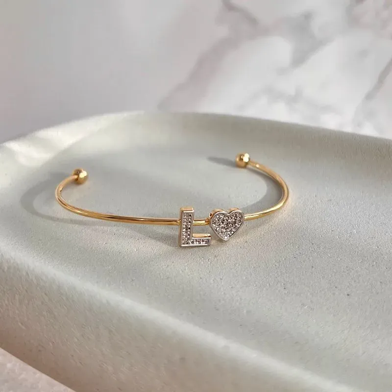 BRACELETE CORAÇÃO COM LETRA CRAVEJADO - L