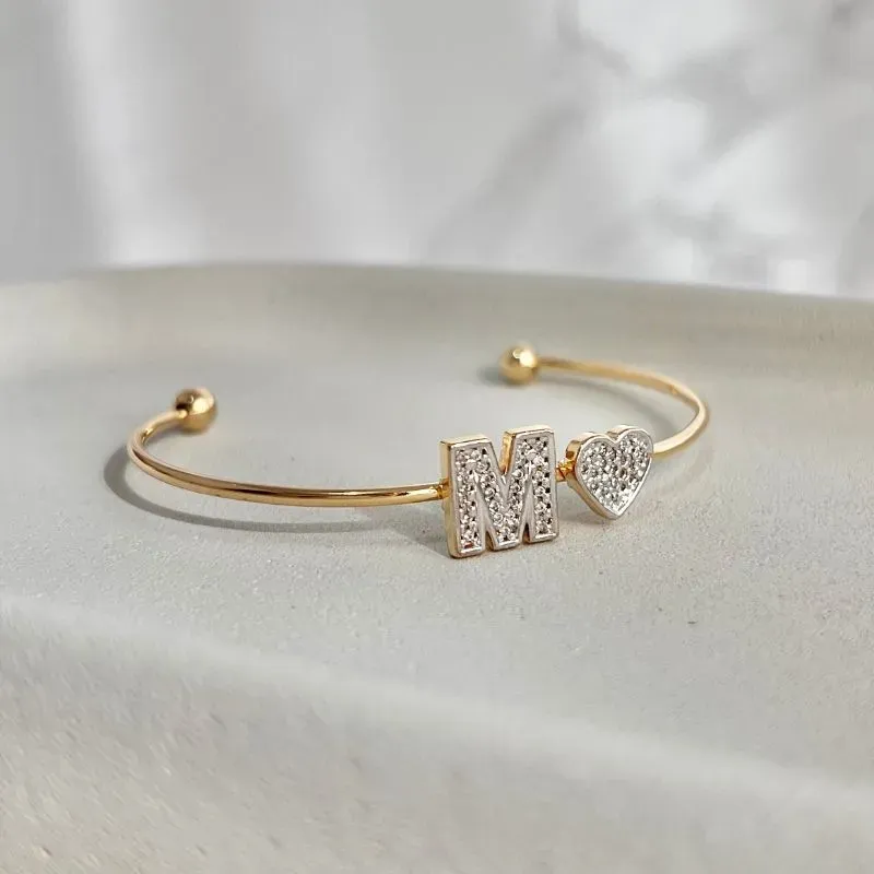 BRACELETE CORAÇÃO COM LETRA CRAVEJADO - M