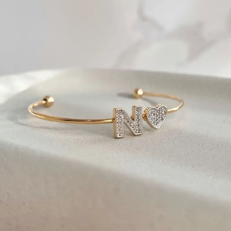BRACELETE CORAÇÃO COM LETRA CRAVEJADO - N