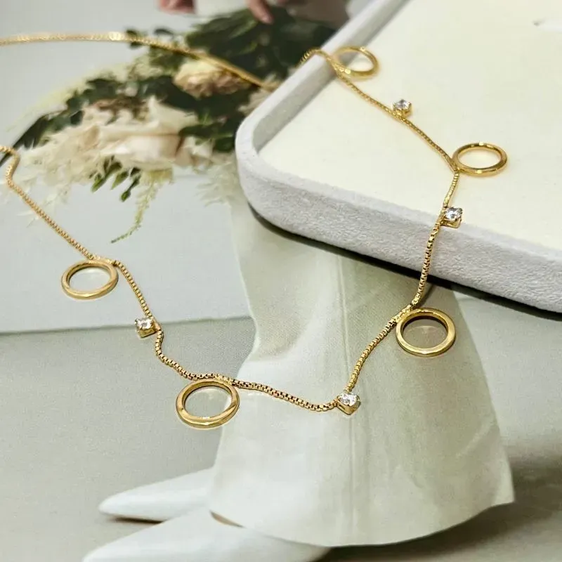 COLAR CHOKER CÍRCULOS E PONTO DE LUZ