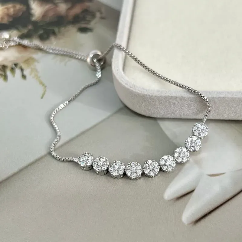 PULSEIRA AJUSTÁVEL FLOR CRAVEJADAS DE ZIRCONIAS