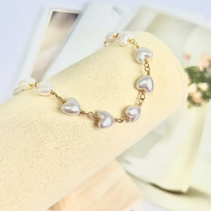 PULSEIRA PÉROLA FORMATO DE CORAÇÃO