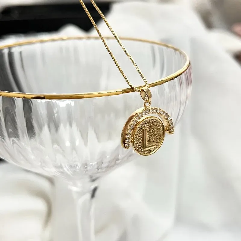 COLAR LETRA GIRATÓRIA ZIRCONIA CRISTAL - L