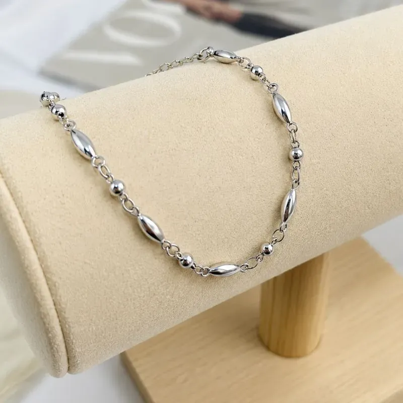 PULSEIRA BOLINHA E GOTAS ACHATADAS