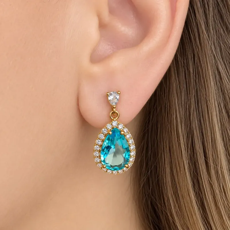 BRINCO GOTA PRINCESA DE ZIRCONIAS AZUL CLARO PENDURADA