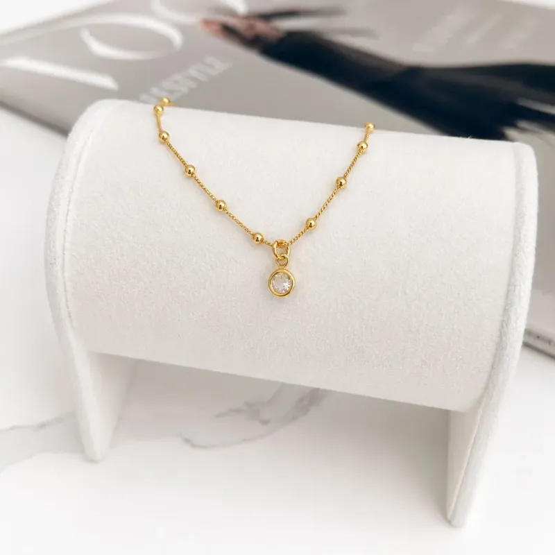 PULSEIRA INFANTIL DE BOLINHAS COM PINGENTE PONTO DE LUZ
