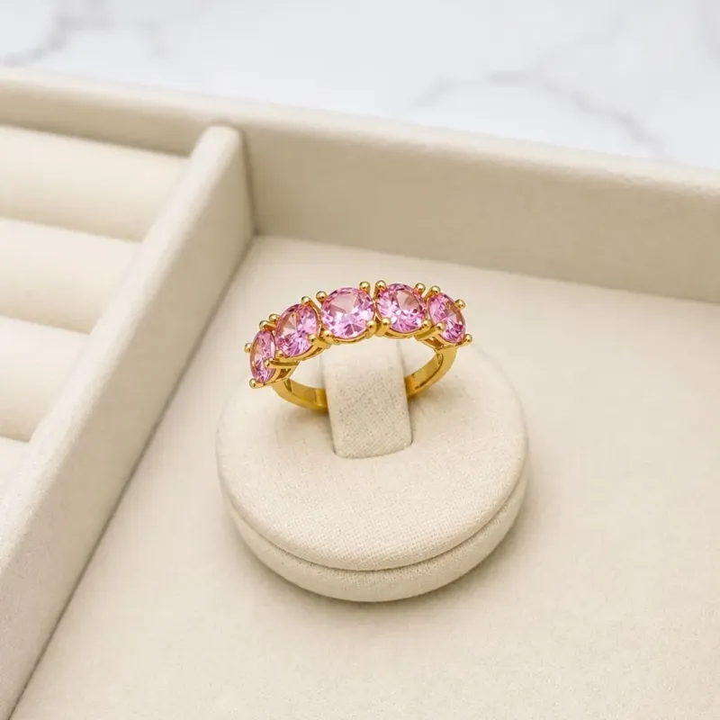ANEL MEIO APARADOR COM 5 ZIRCONIAS ROSA CLARO