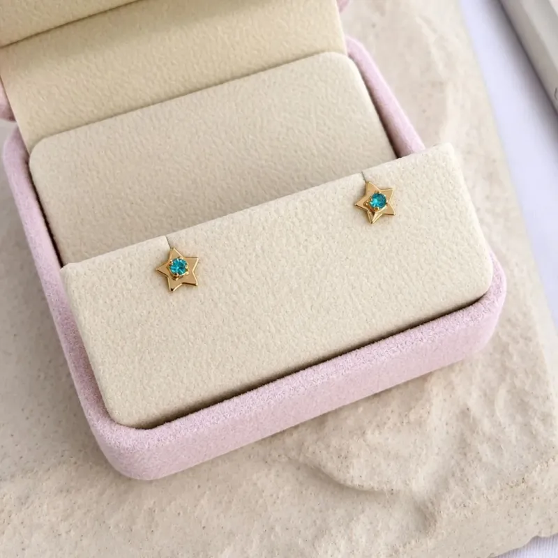 BRINCO ESTRELA COM PEDRINHA DE STRASS AZUL
